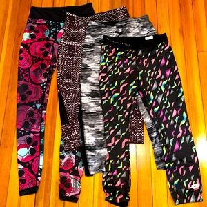 Workout legging bundle of 4 RBX and miscellaneous brands Reversible skulls Sz S